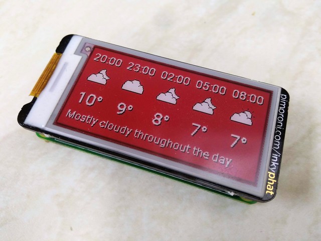 Raspberry Pi Zero with red eink display showing the weather for the next 12 hours
